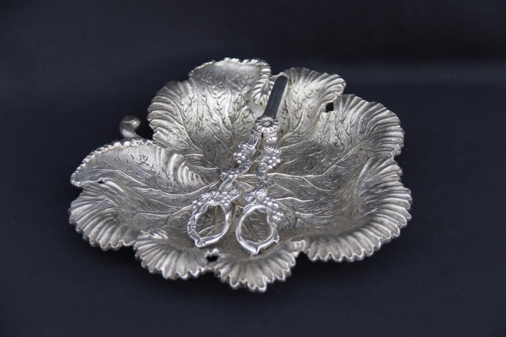 A rare late 19th century silver plated and hand engraved grape salver with matching grape scissors. View X