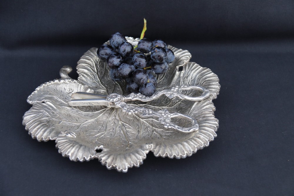 A rare late 19th century silver plated and hand engraved grape salver with matching grape scissors. View XIV
