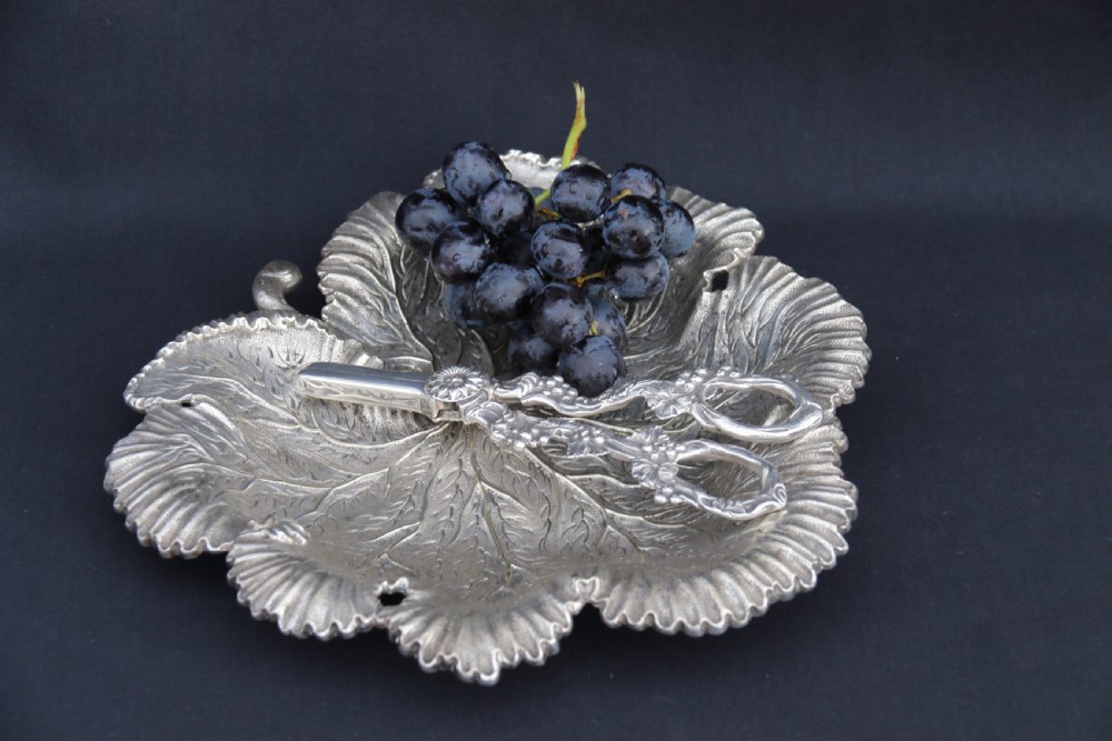 A rare late 19th century silver plated and hand engraved grape salver with matching grape scissors. View XVI