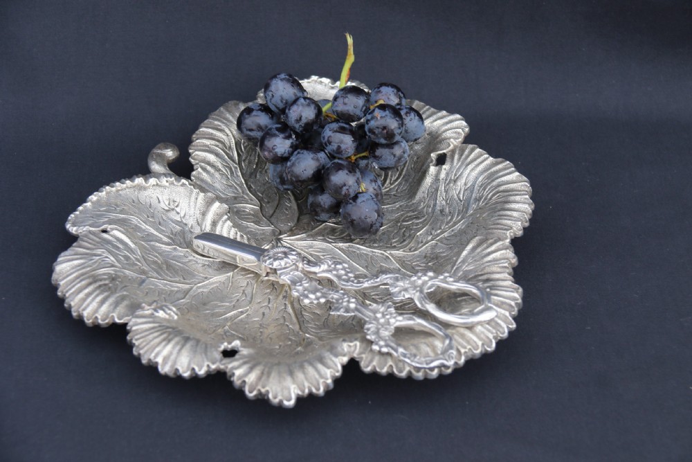 A rare late 19th century silver plated and hand engraved grape salver with matching grape scissors. View XVII