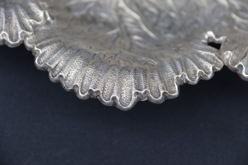 A rare late 19th century silver plated and hand engraved grape salver with matching grape scissors. View XXVII