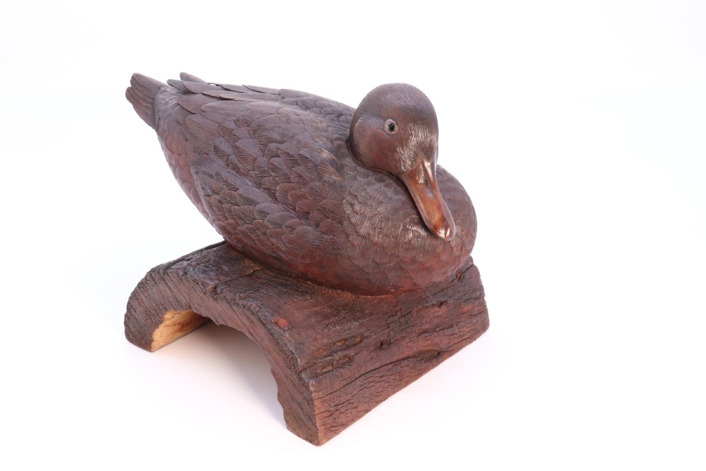 A superb Black Forest carved linden wood study of  a perched mallard duck.

 View II