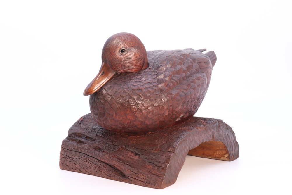 A superb Black Forest carved linden wood study of  a perched mallard duck.

 View V