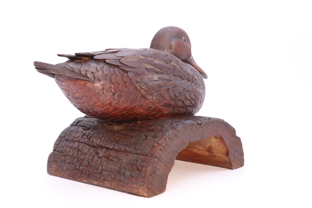 A superb Black Forest carved linden wood study of  a perched mallard duck.

 View IX