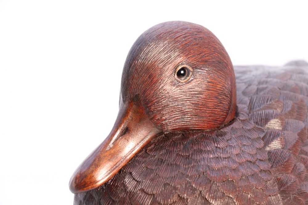 A superb Black Forest carved linden wood study of  a perched mallard duck.

 View XIV