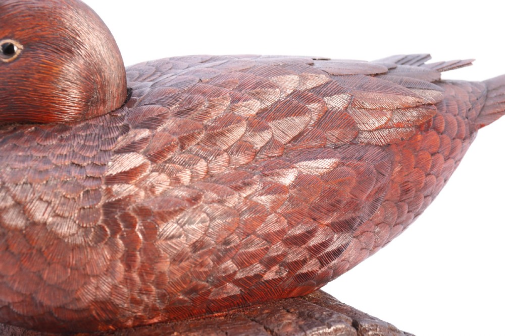 A superb Black Forest carved linden wood study of  a perched mallard duck.

 View XV
