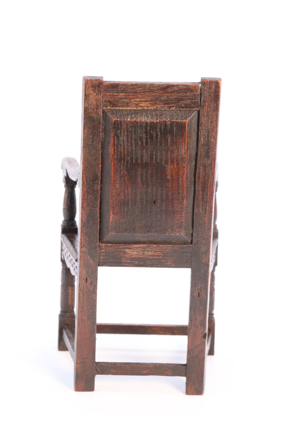 An exceptional miniature country oak panelled and carved wainscot armchair, circa 1900

 View V