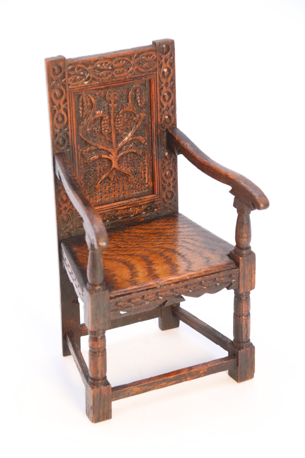 An exceptional miniature country oak panelled and carved wainscot armchair, circa 1900

 View VIII