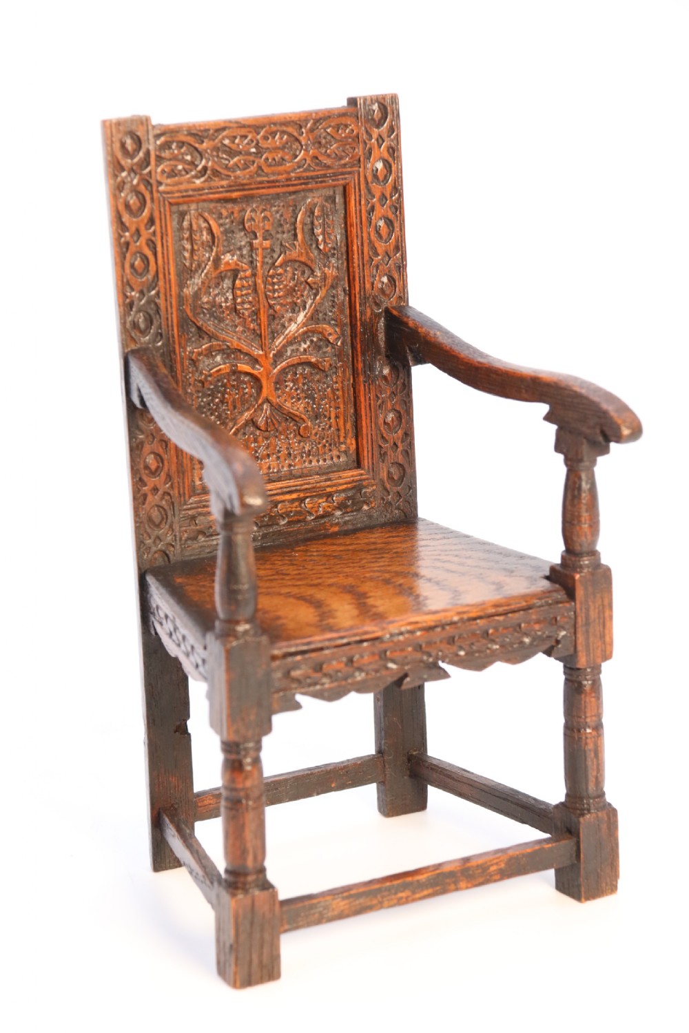 An exceptional miniature country oak panelled and carved wainscot armchair, circa 1900

 View XII