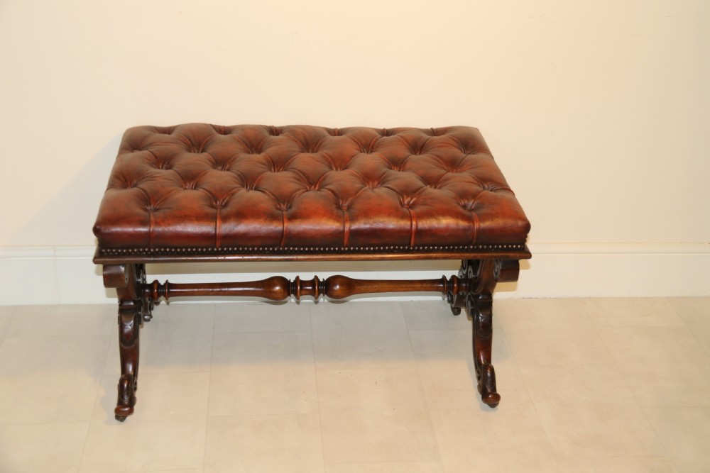 19th century large carved walnut and leather upholstered stool

 View II