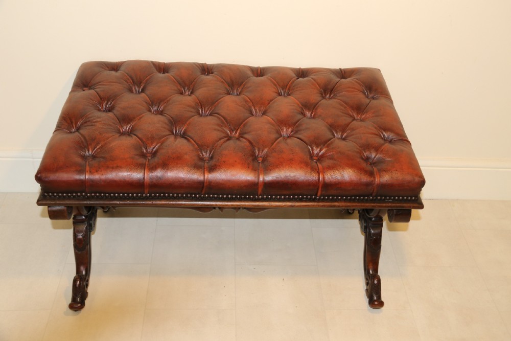 19th century large carved walnut and leather upholstered stool

 View III