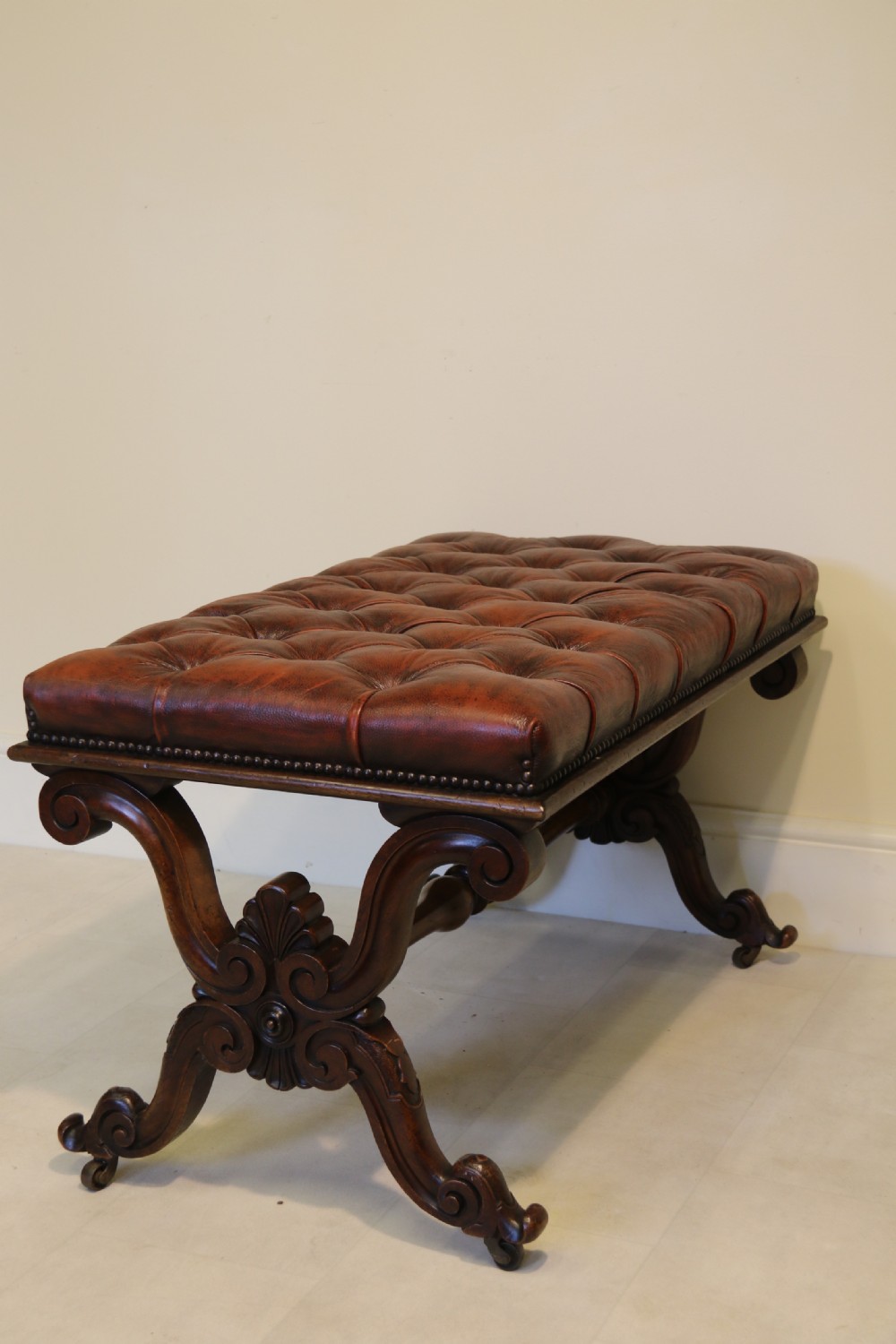 19th century large carved walnut and leather upholstered stool

 View IV