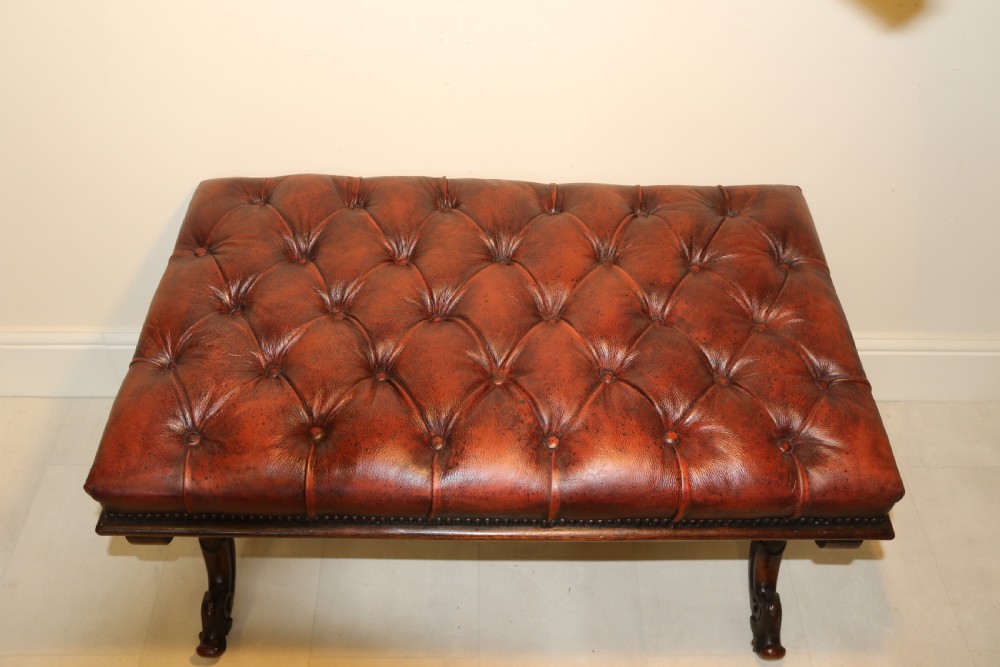 19th century large carved walnut and leather upholstered stool

 View VI