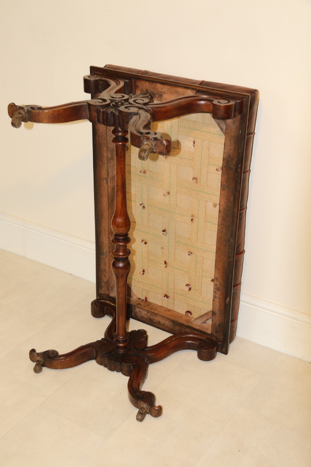 19th century large carved walnut and leather upholstered stool

 View VII