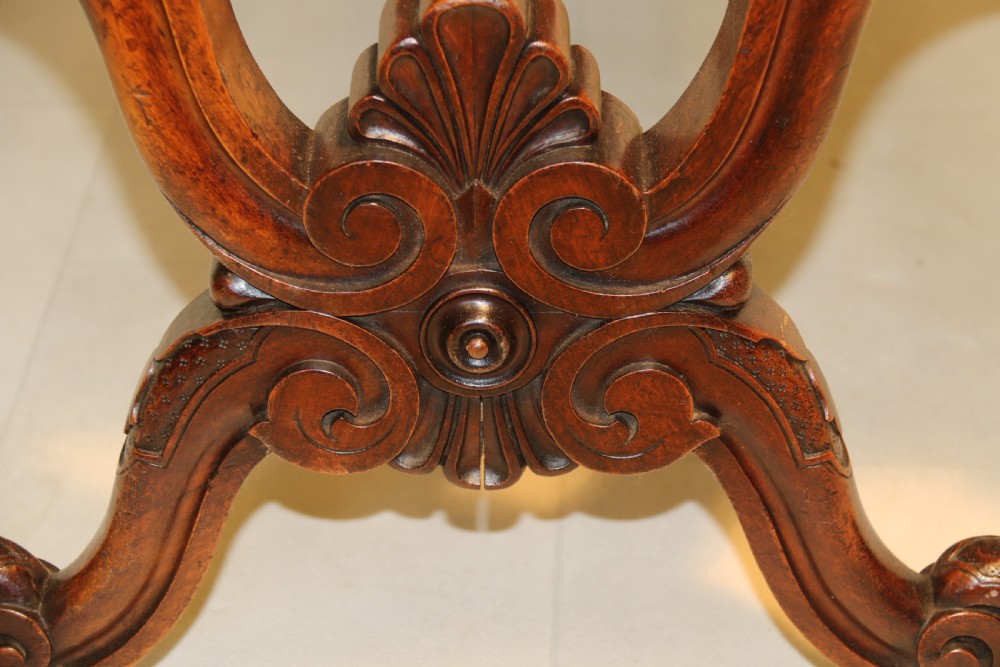 19th century large carved walnut and leather upholstered stool

 View X