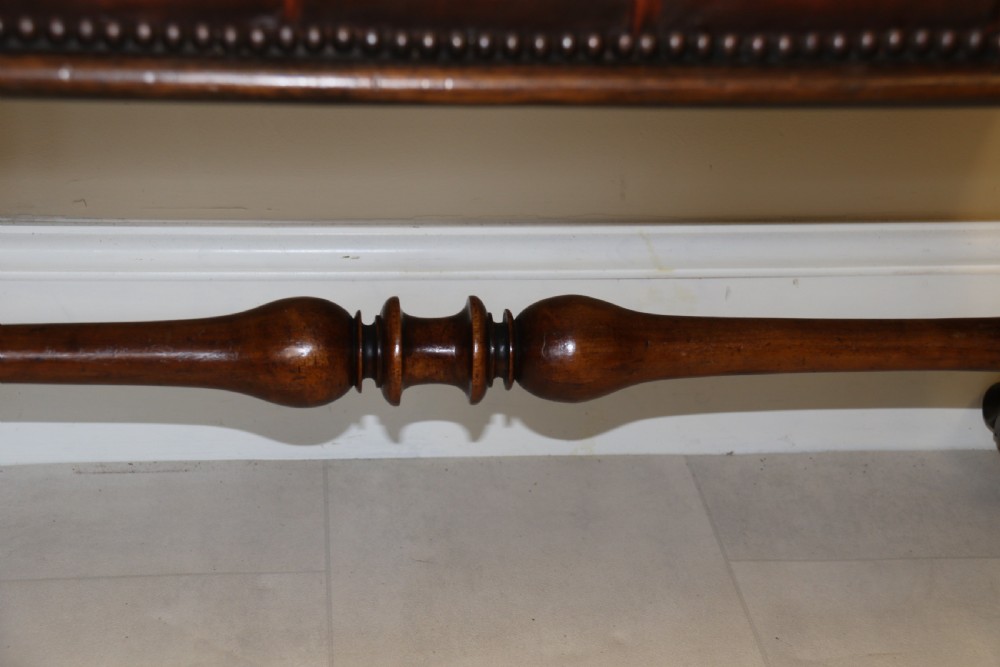 19th century large carved walnut and leather upholstered stool

 View XII