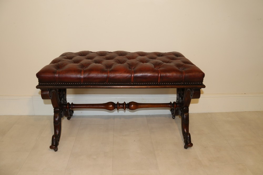 19th century large carved walnut and leather upholstered stool

 View XIV