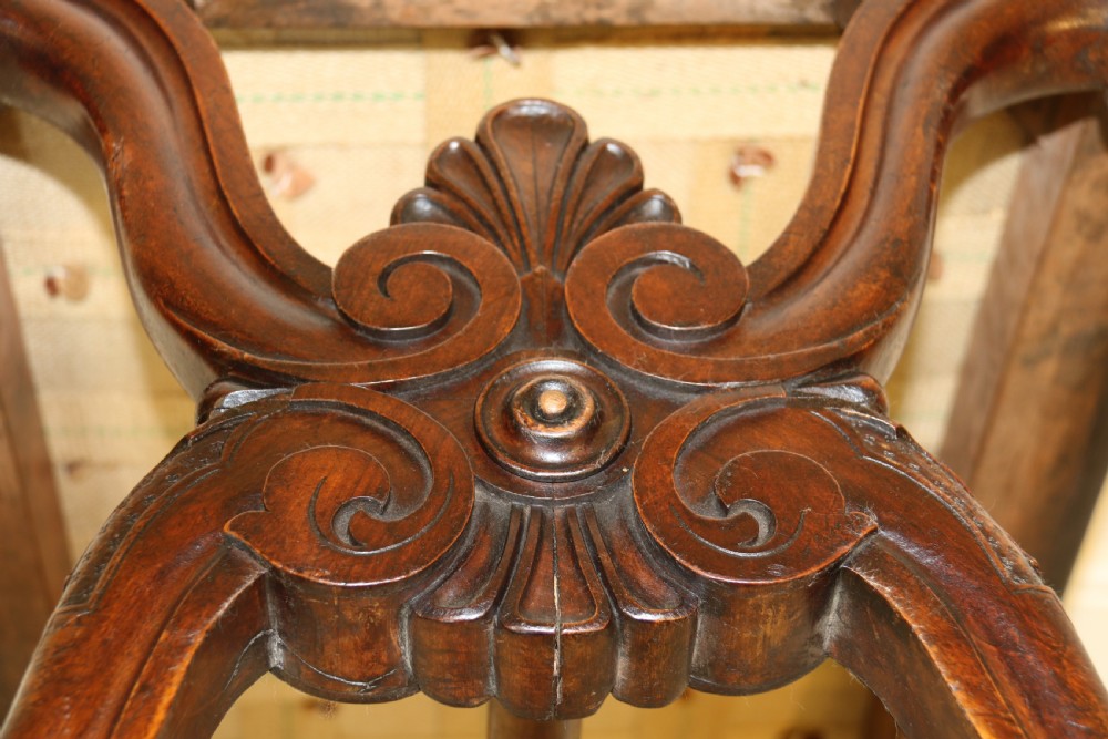 19th century large carved walnut and leather upholstered stool

 View XVI