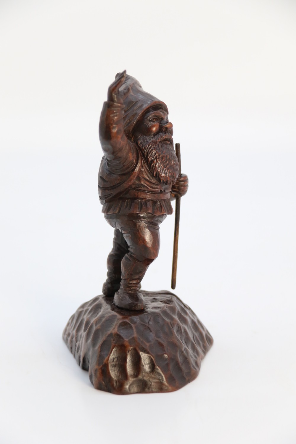A rare late 19th century Black Forest carved walnut figure of a gnome View III