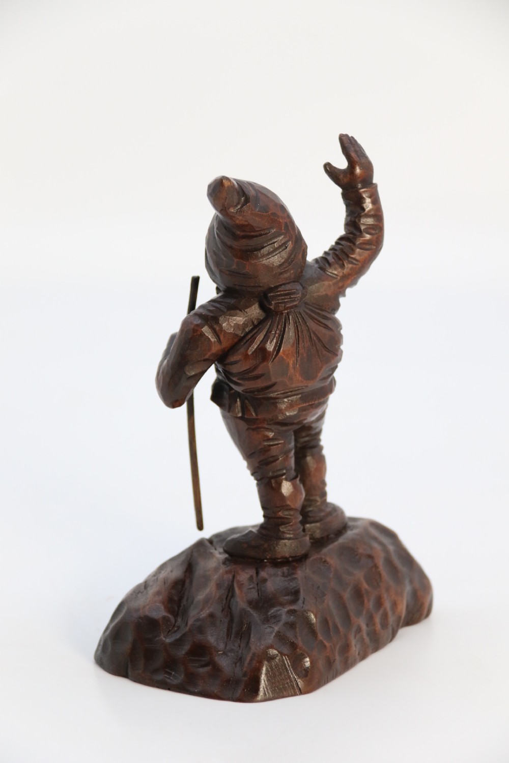 A rare late 19th century Black Forest carved walnut figure of a gnome View VI