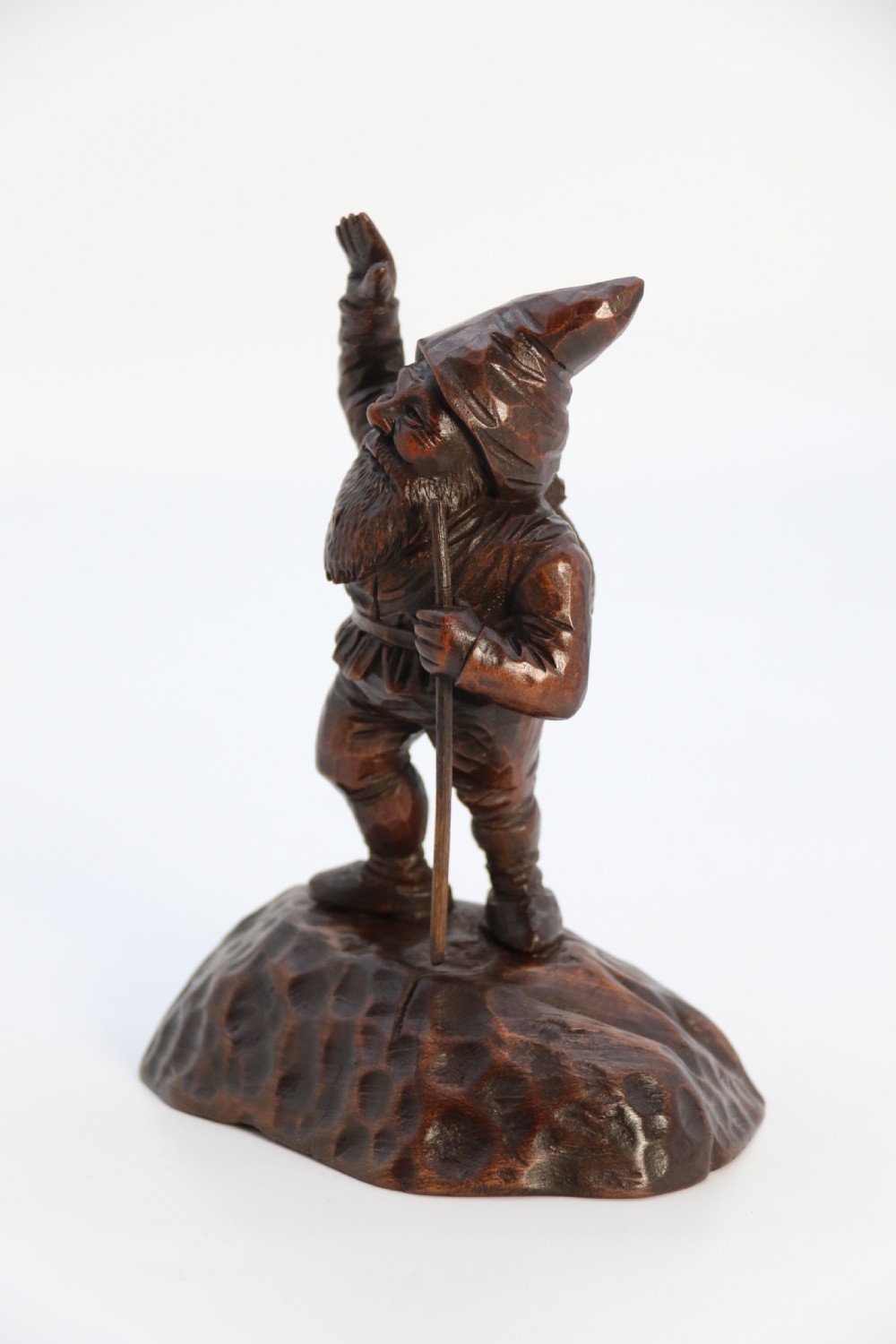 A rare late 19th century Black Forest carved walnut figure of a gnome View VII