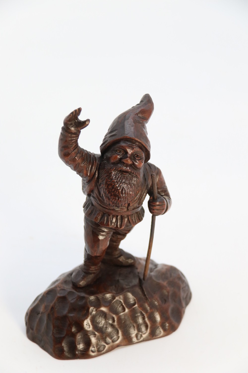 A rare late 19th century Black Forest carved walnut figure of a gnome View X