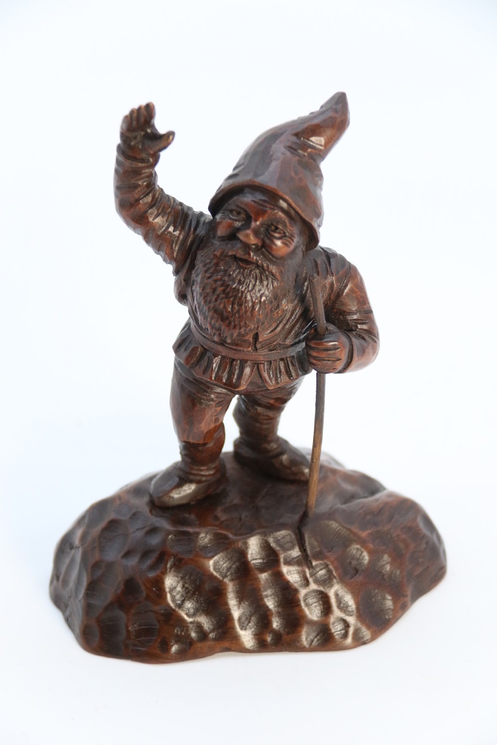 A rare late 19th century Black Forest carved walnut figure of a gnome View XI