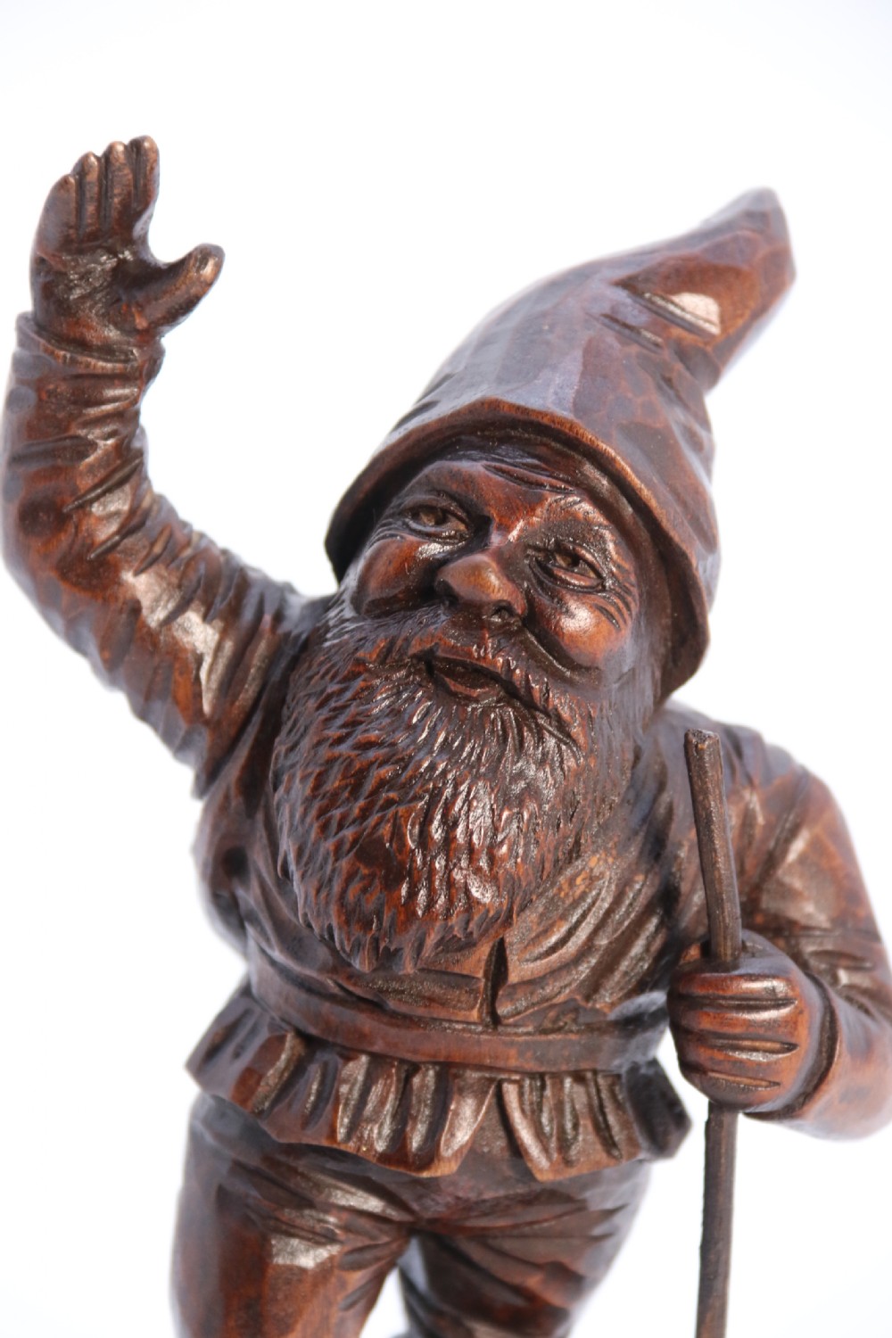 A rare late 19th century Black Forest carved walnut figure of a gnome View XII