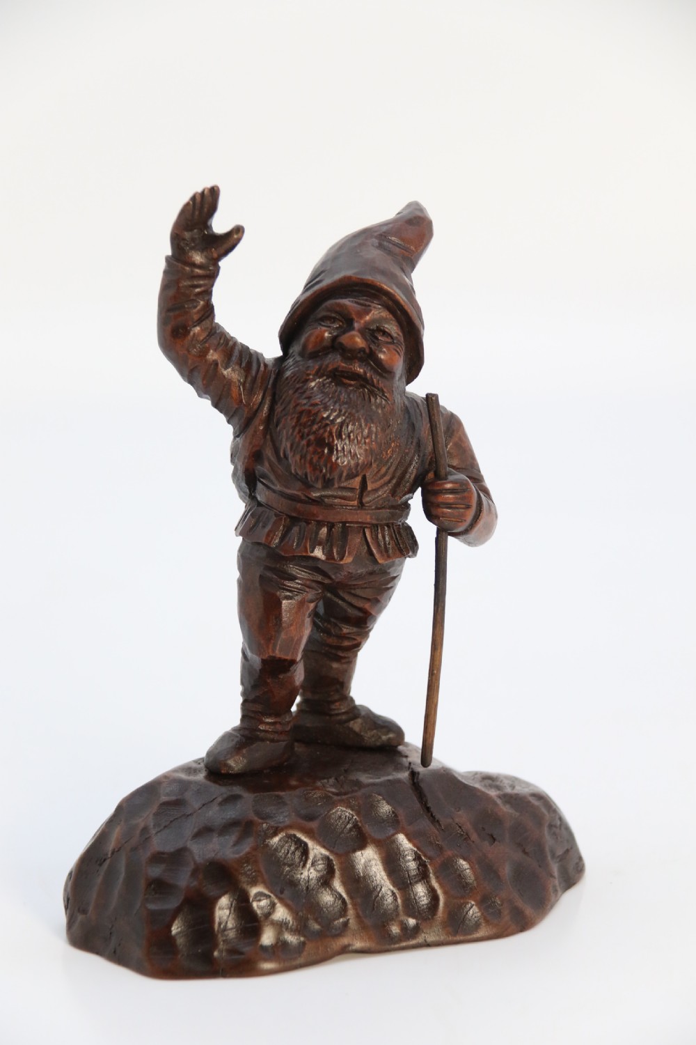 A rare late 19th century Black Forest carved walnut figure of a gnome View XV