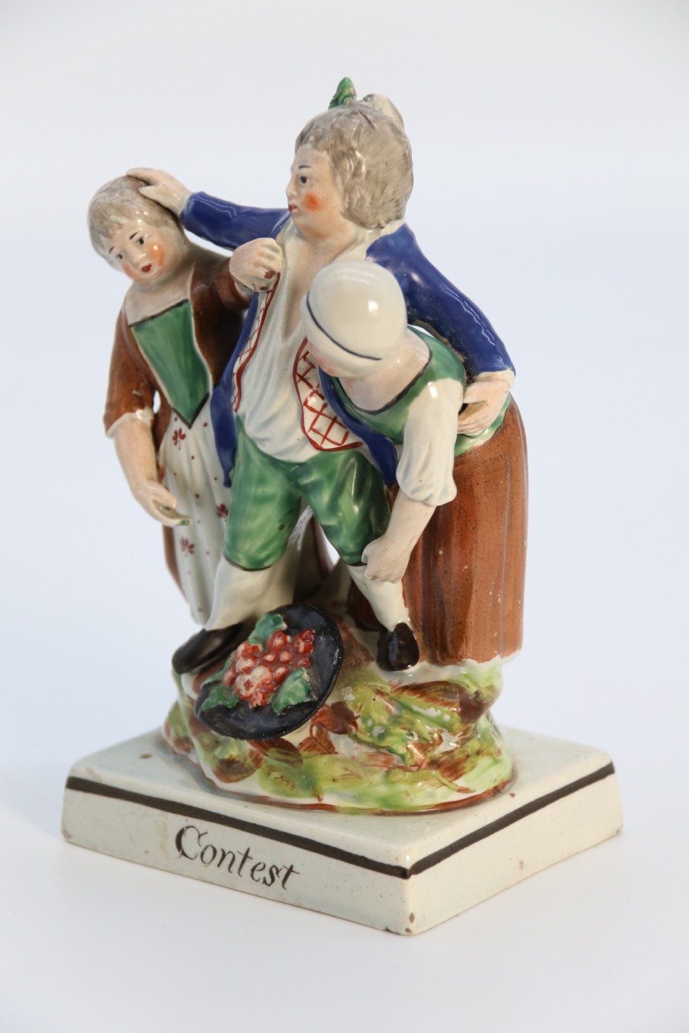 A rare pair of late 18th century English Staffordshire figure groups of two young men about to have a scuffle. View IX