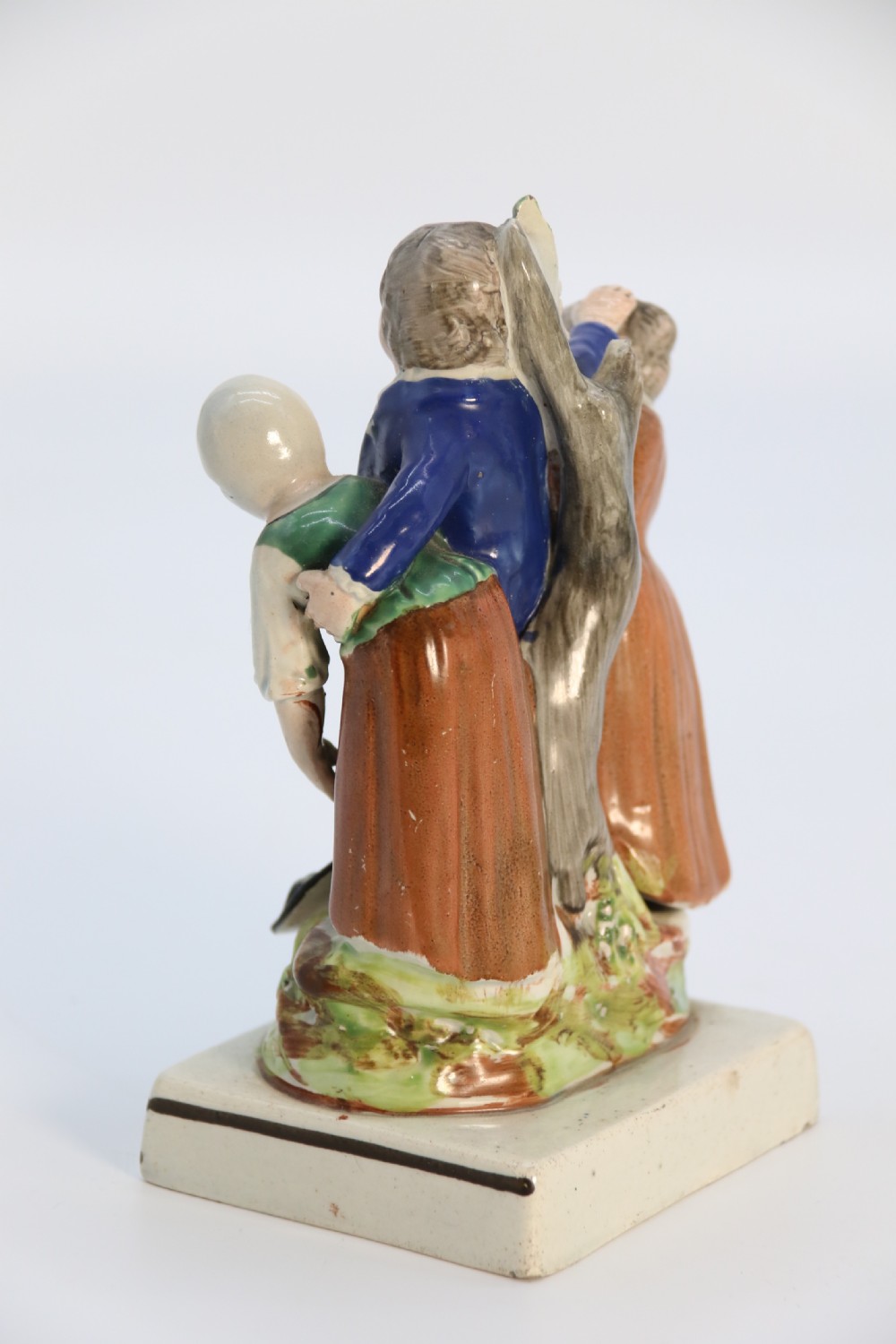 A rare pair of late 18th century English Staffordshire figure groups of two young men about to have a scuffle. View XI