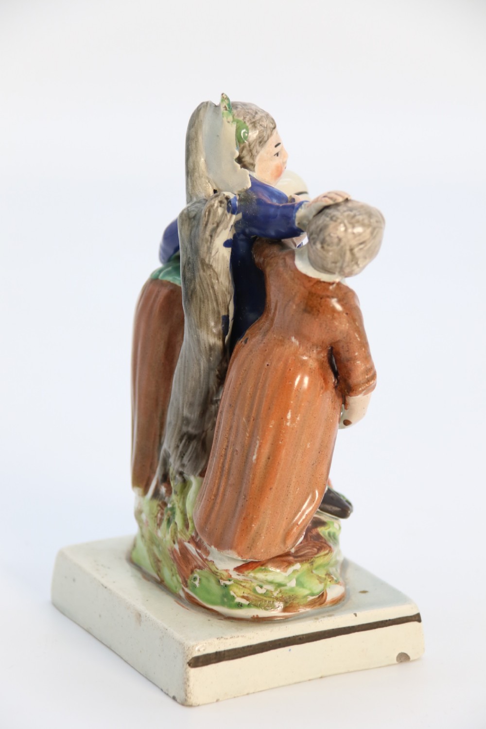 A rare pair of late 18th century English Staffordshire figure groups of two young men about to have a scuffle. View XIII