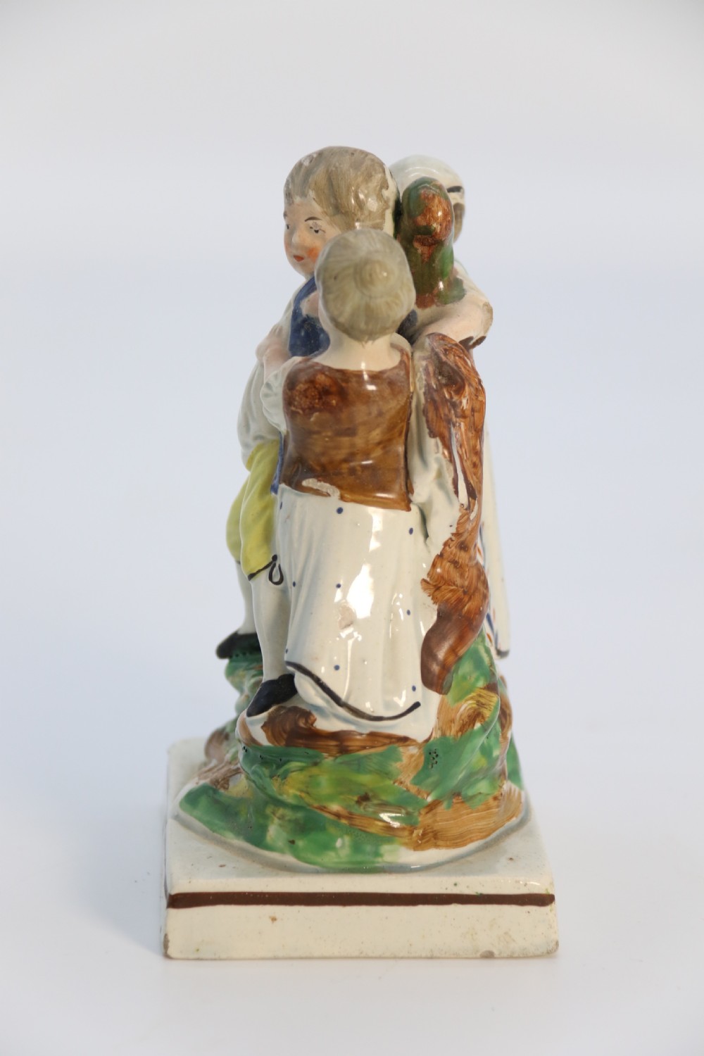 A rare pair of late 18th century English Staffordshire figure groups of two young men about to have a scuffle. View XVII