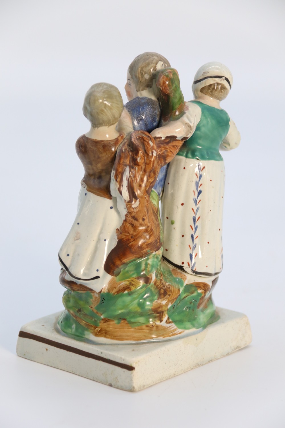 A rare pair of late 18th century English Staffordshire figure groups of two young men about to have a scuffle. View XVIII