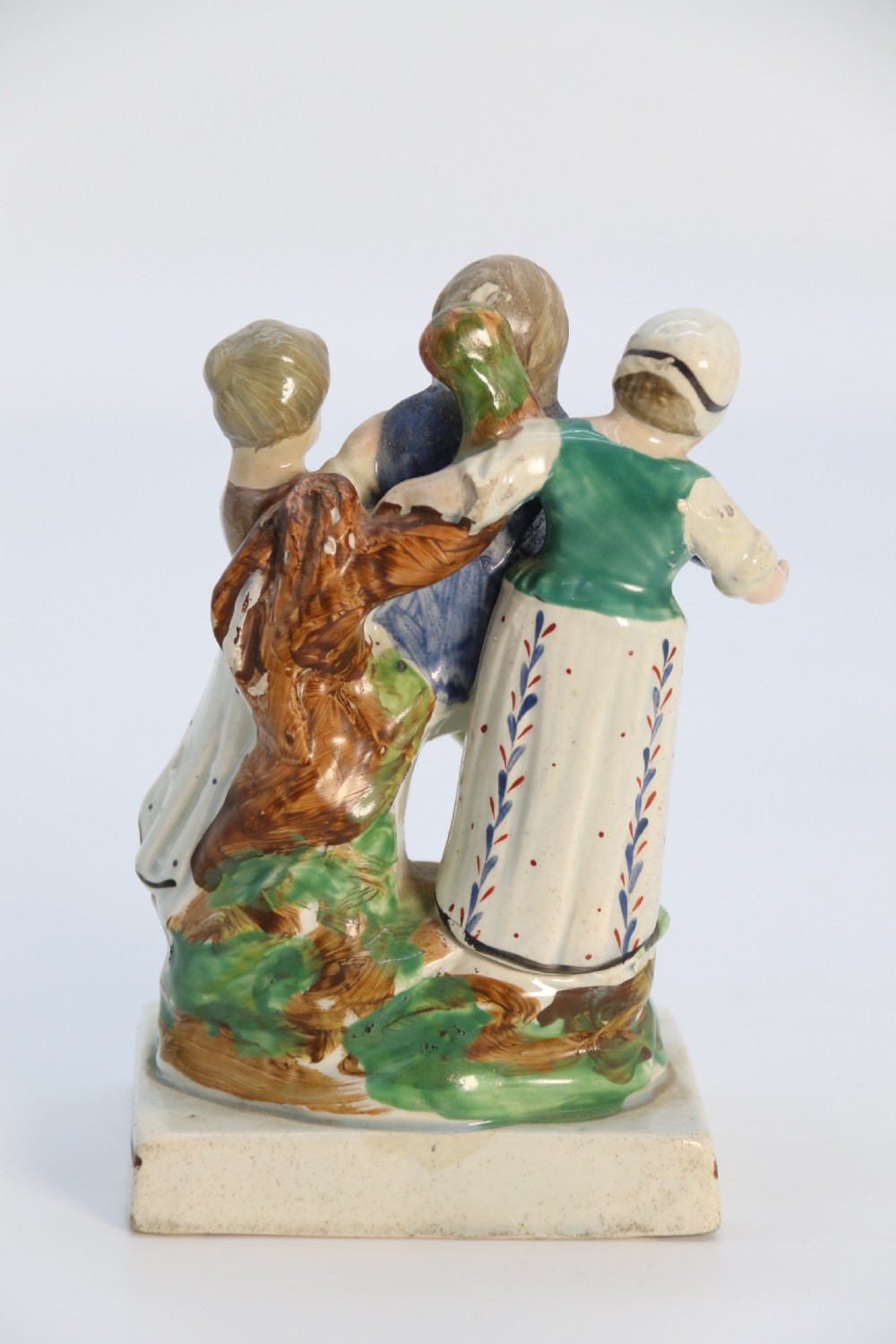 A rare pair of late 18th century English Staffordshire figure groups of two young men about to have a scuffle. View XIX