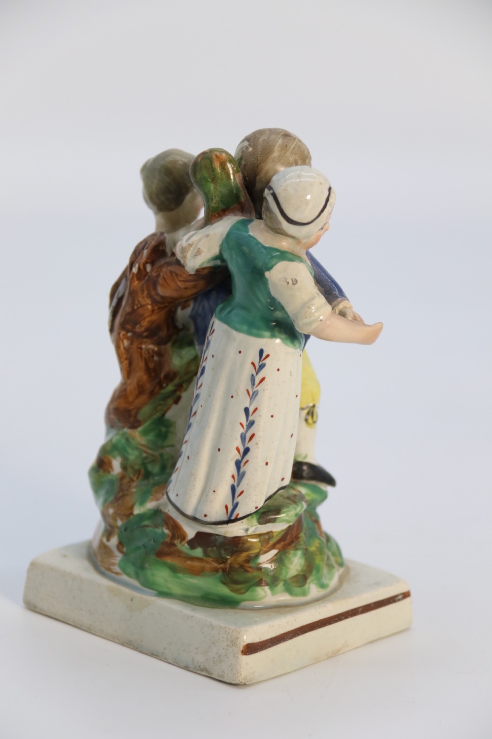 A rare pair of late 18th century English Staffordshire figure groups of two young men about to have a scuffle. View XX