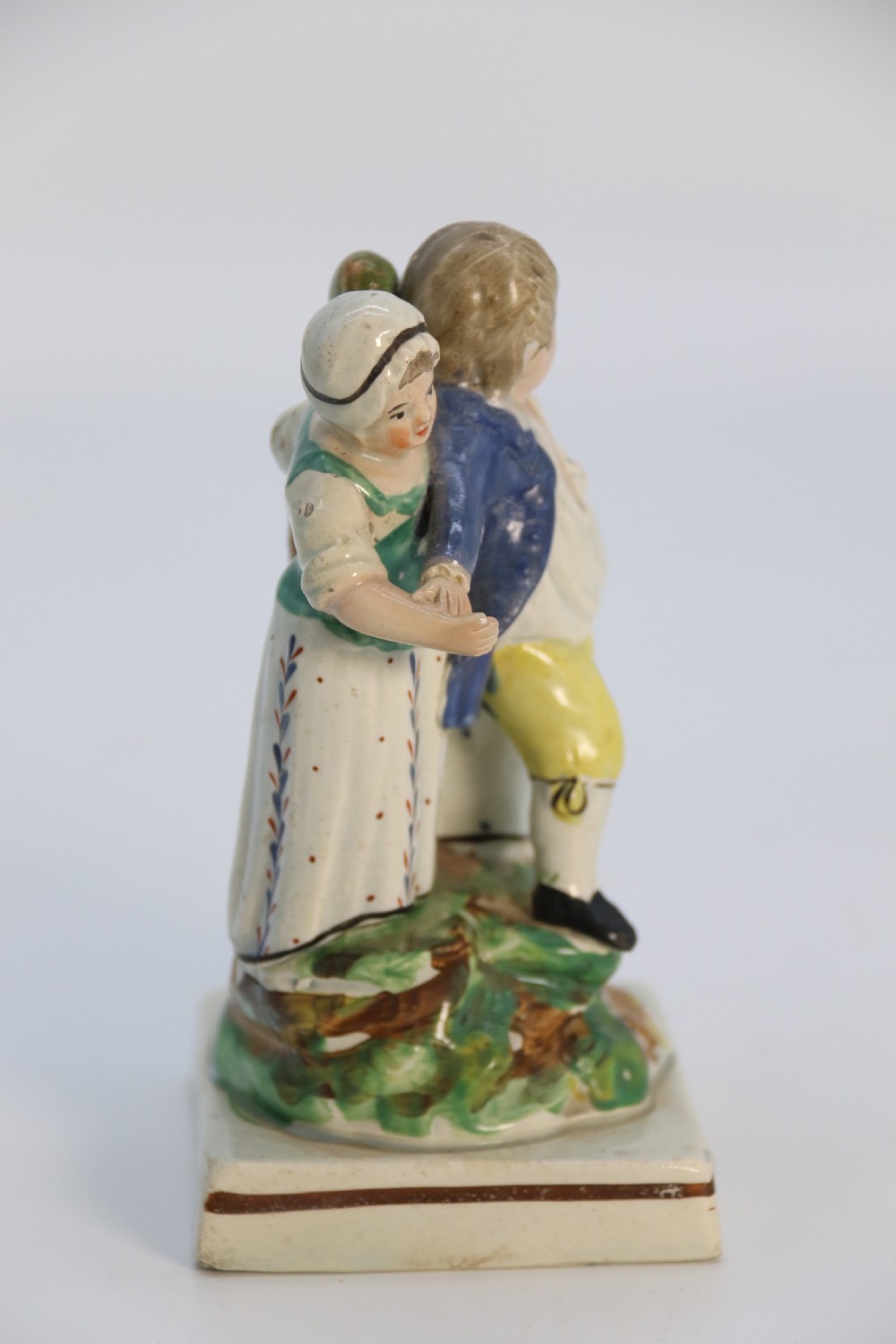 A rare pair of late 18th century English Staffordshire figure groups of two young men about to have a scuffle. View XXI