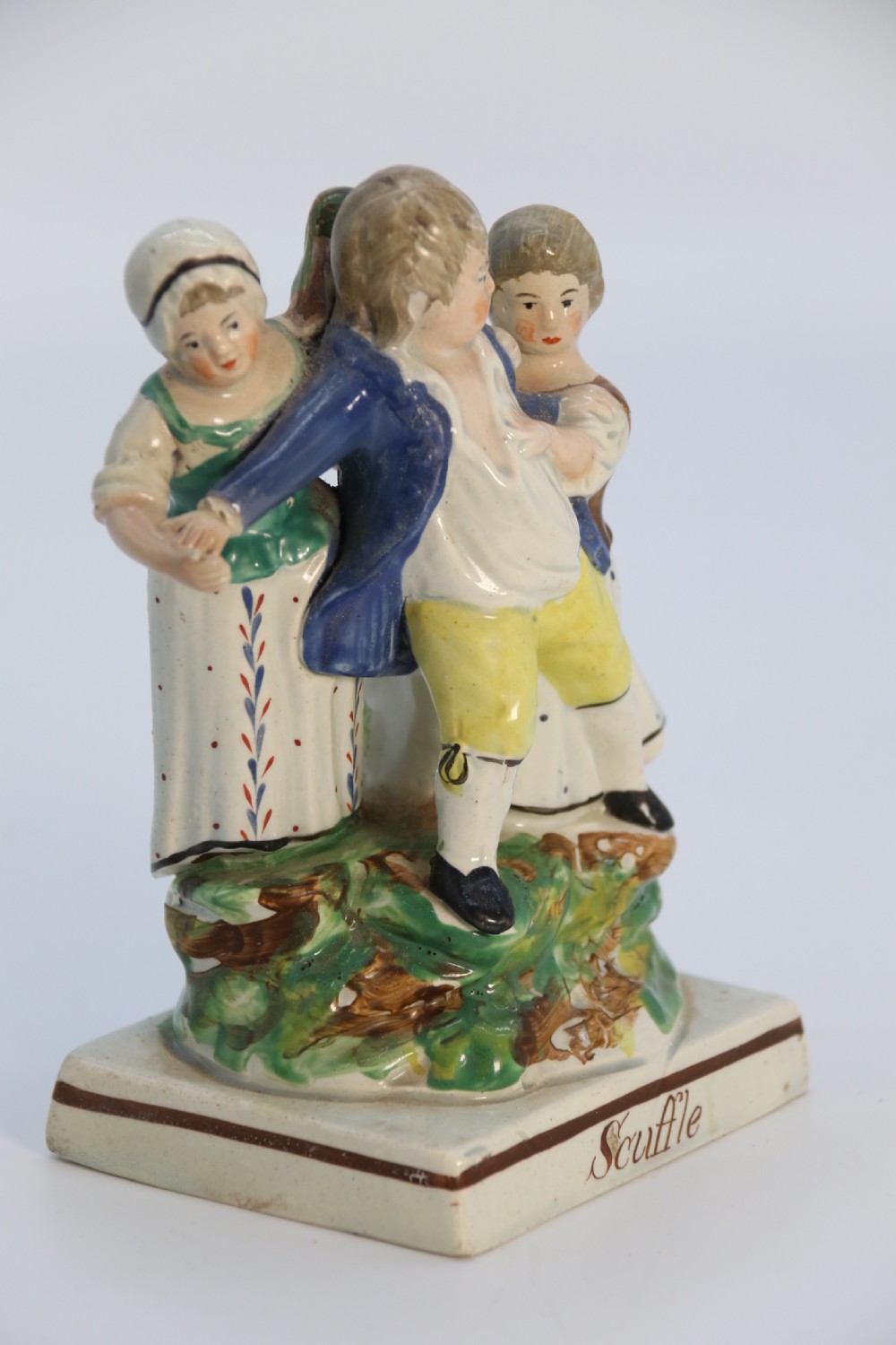A rare pair of late 18th century English Staffordshire figure groups of two young men about to have a scuffle. View XXII