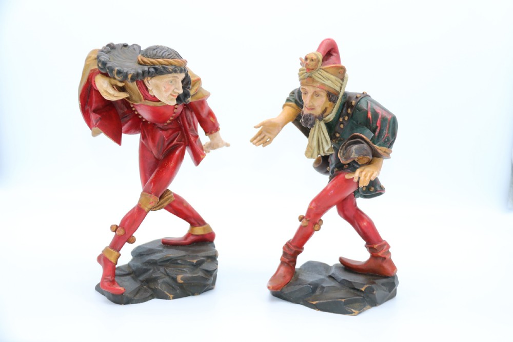 A superb pair of Black Forest carved lime wood and polychrome painted dancing jester figures View III