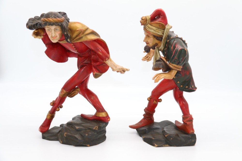 A superb pair of Black Forest carved lime wood and polychrome painted dancing jester figures View IV