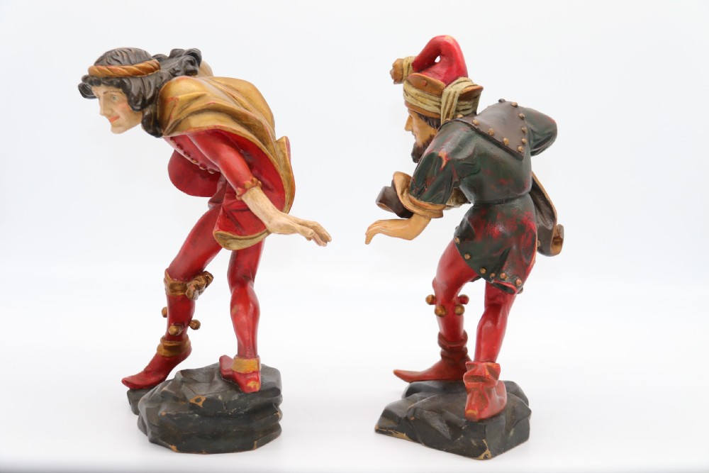 A superb pair of Black Forest carved lime wood and polychrome painted dancing jester figures View V