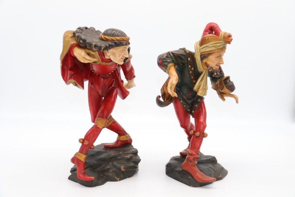 A superb pair of Black Forest carved lime wood and polychrome painted dancing jester figures View XI