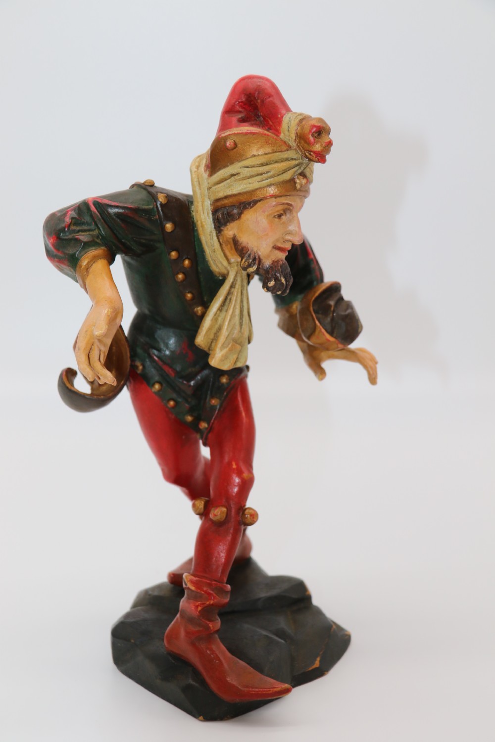 A superb pair of Black Forest carved lime wood and polychrome painted dancing jester figures View XII