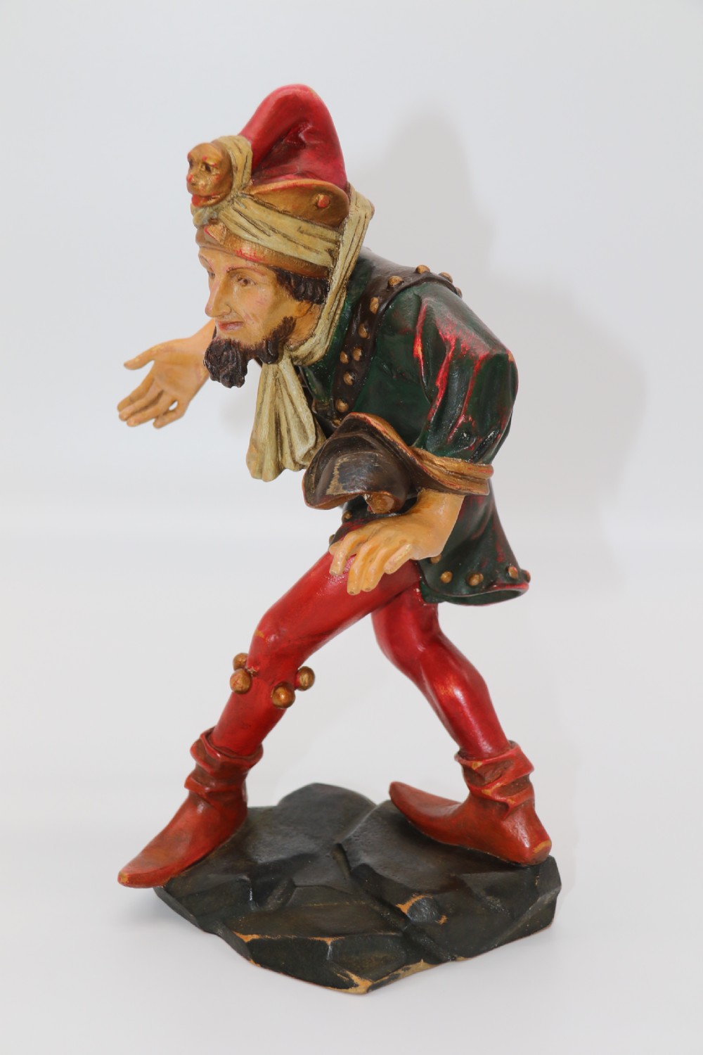 A superb pair of Black Forest carved lime wood and polychrome painted dancing jester figures View XVI