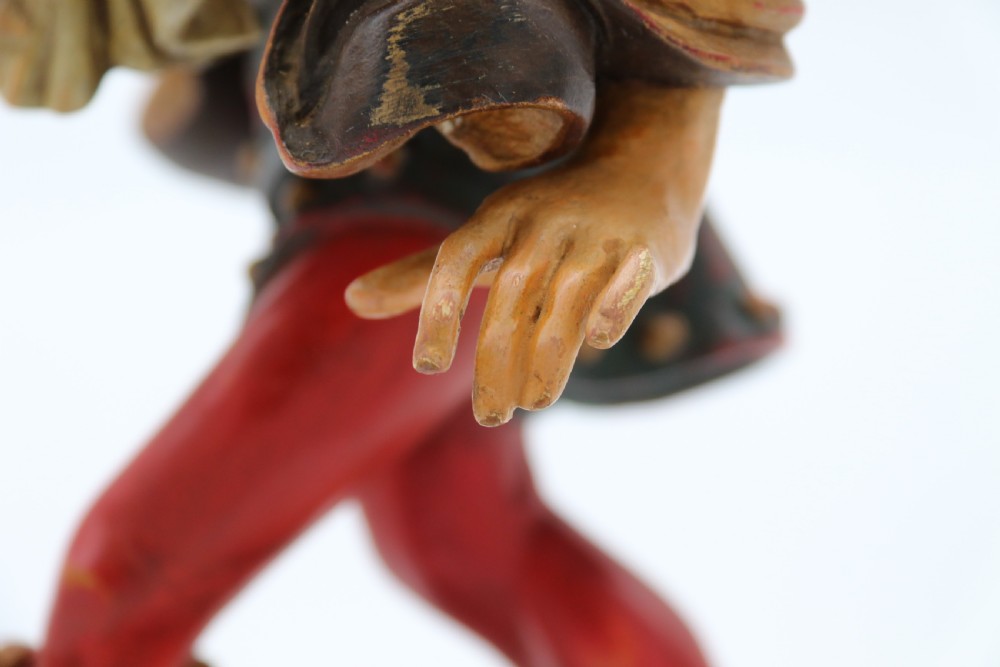 A superb pair of Black Forest carved lime wood and polychrome painted dancing jester figures View XXVII