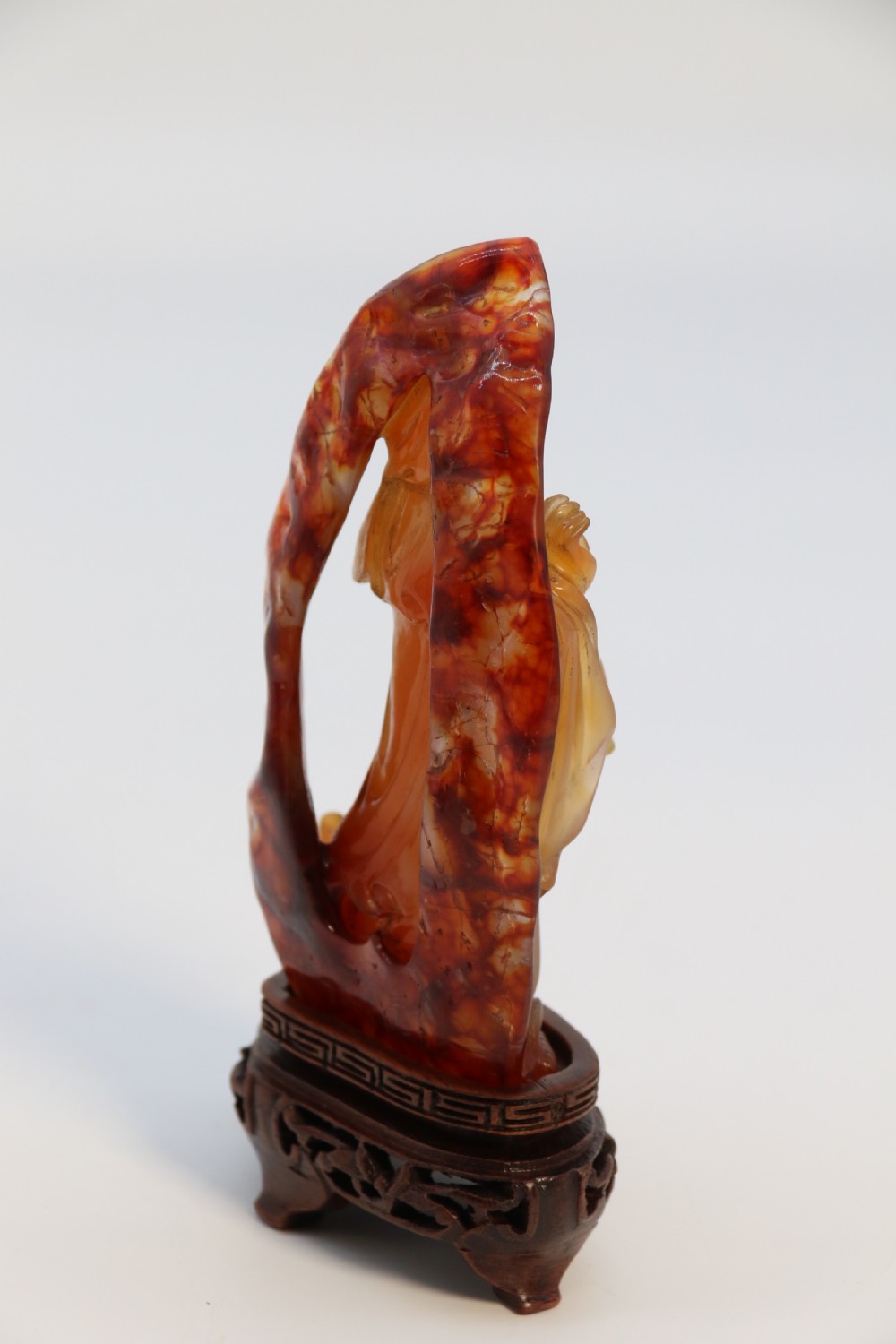 A very fine and rare Chinese hand carved agate hardstone figure of the goddess Guanyin. View IV