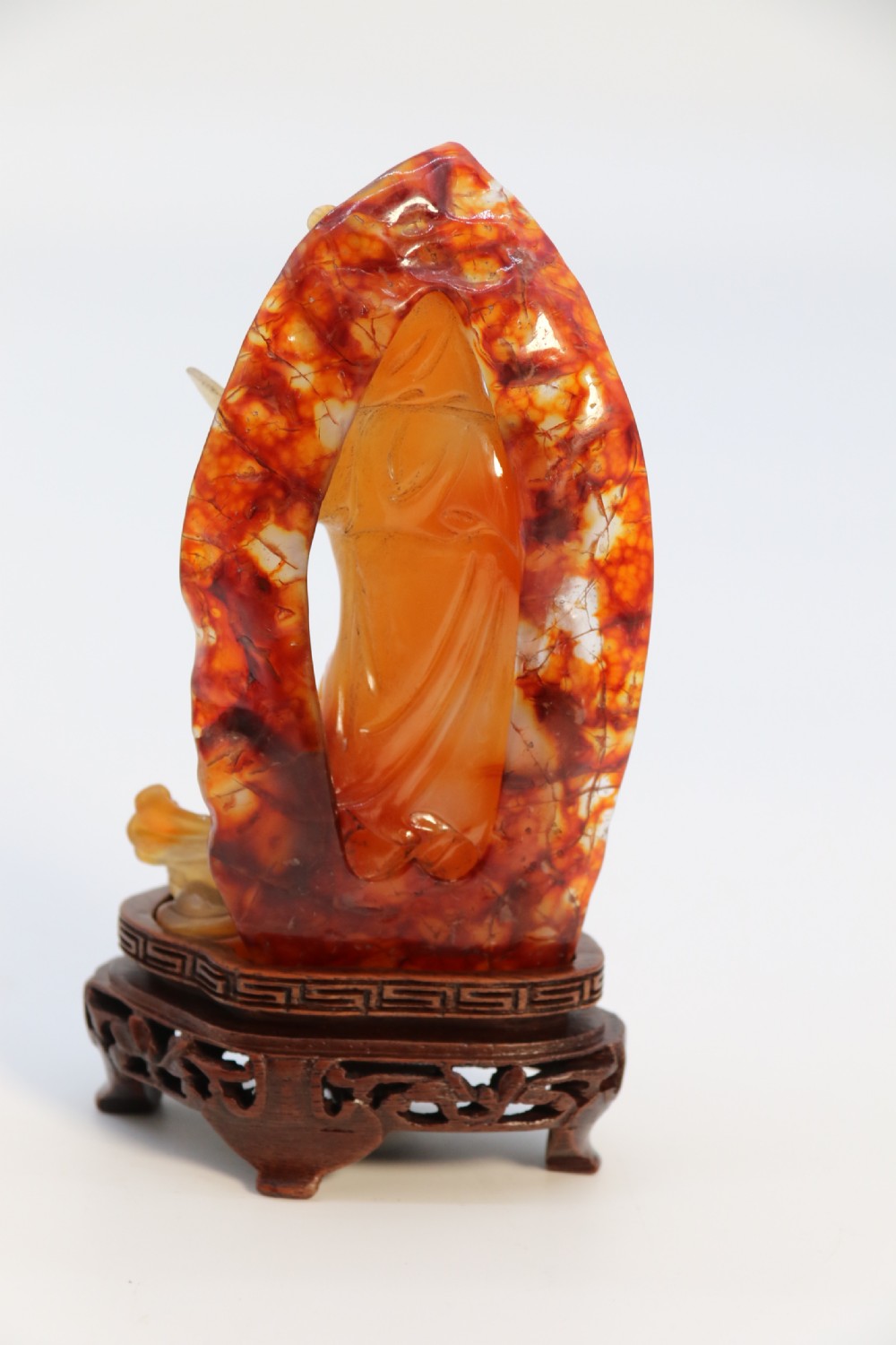 A very fine and rare Chinese hand carved agate hardstone figure of the goddess Guanyin. View V