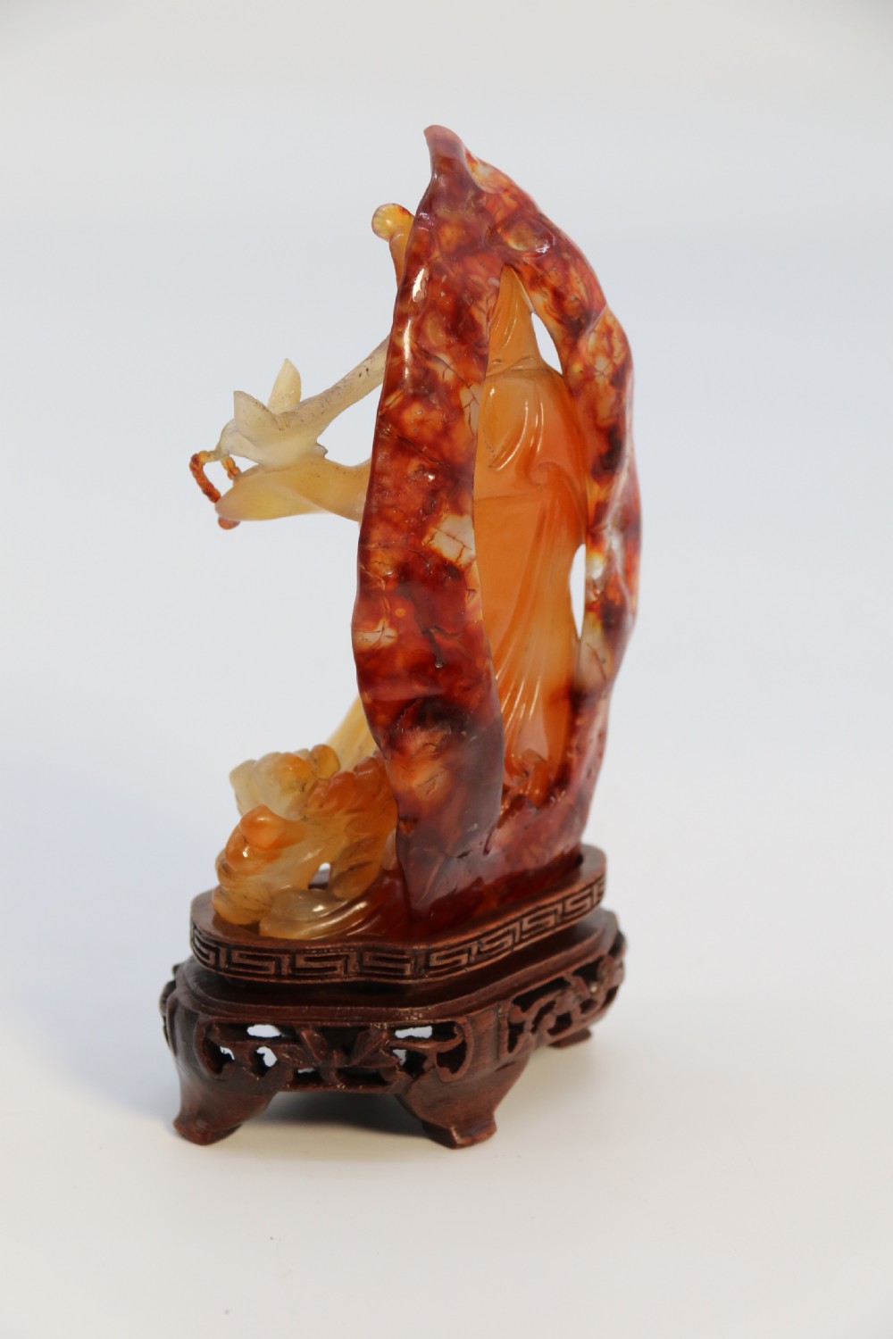 A very fine and rare Chinese hand carved agate hardstone figure of the goddess Guanyin. View VI