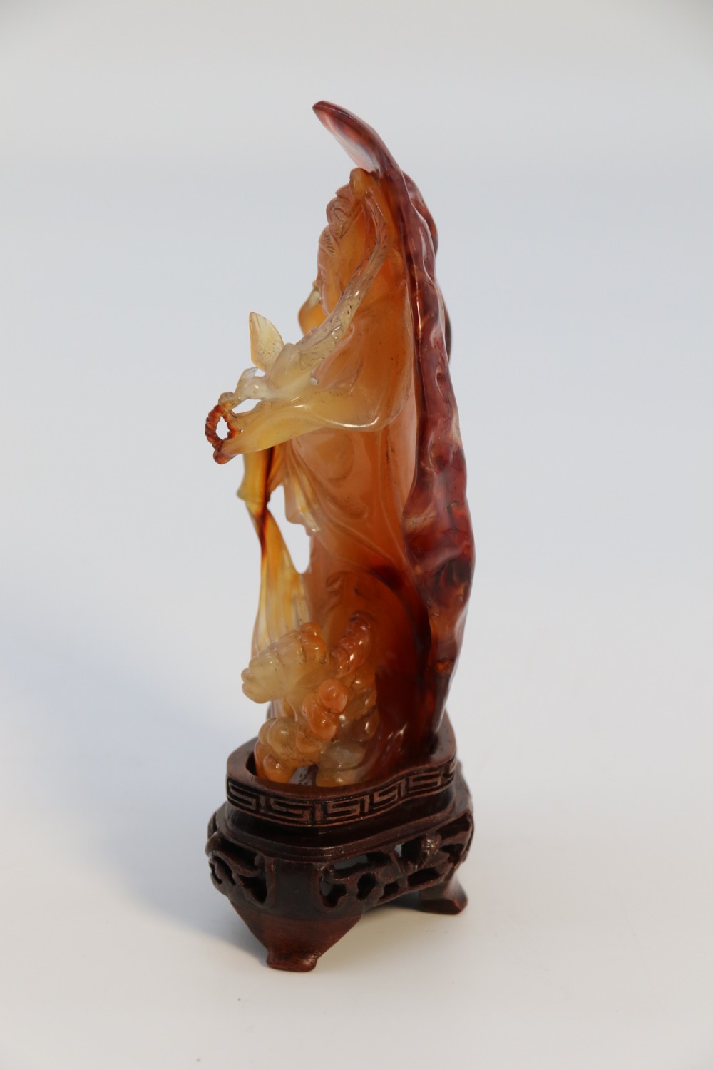 A very fine and rare Chinese hand carved agate hardstone figure of the goddess Guanyin. View VII