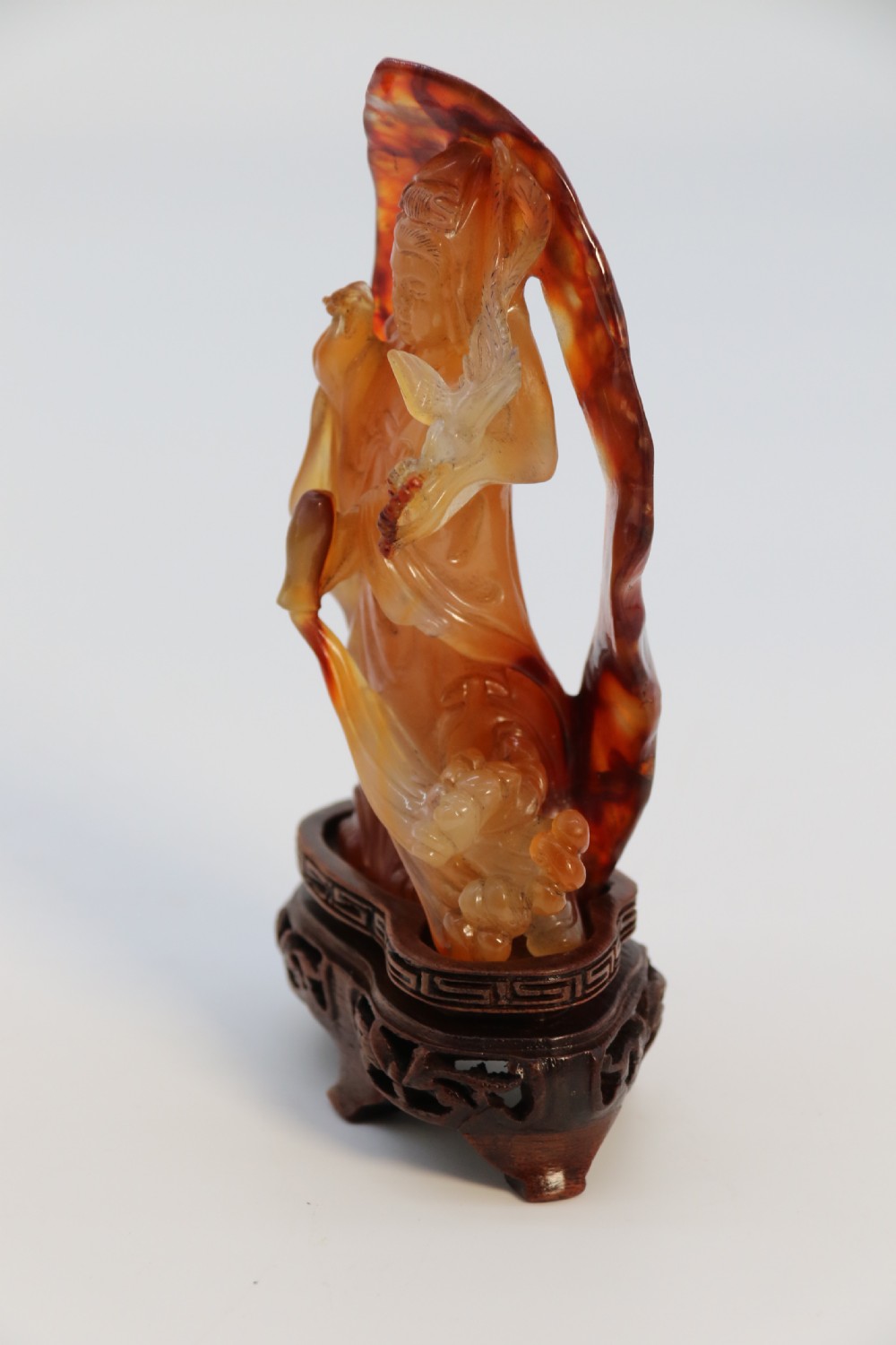 A very fine and rare Chinese hand carved agate hardstone figure of the goddess Guanyin. View VIII